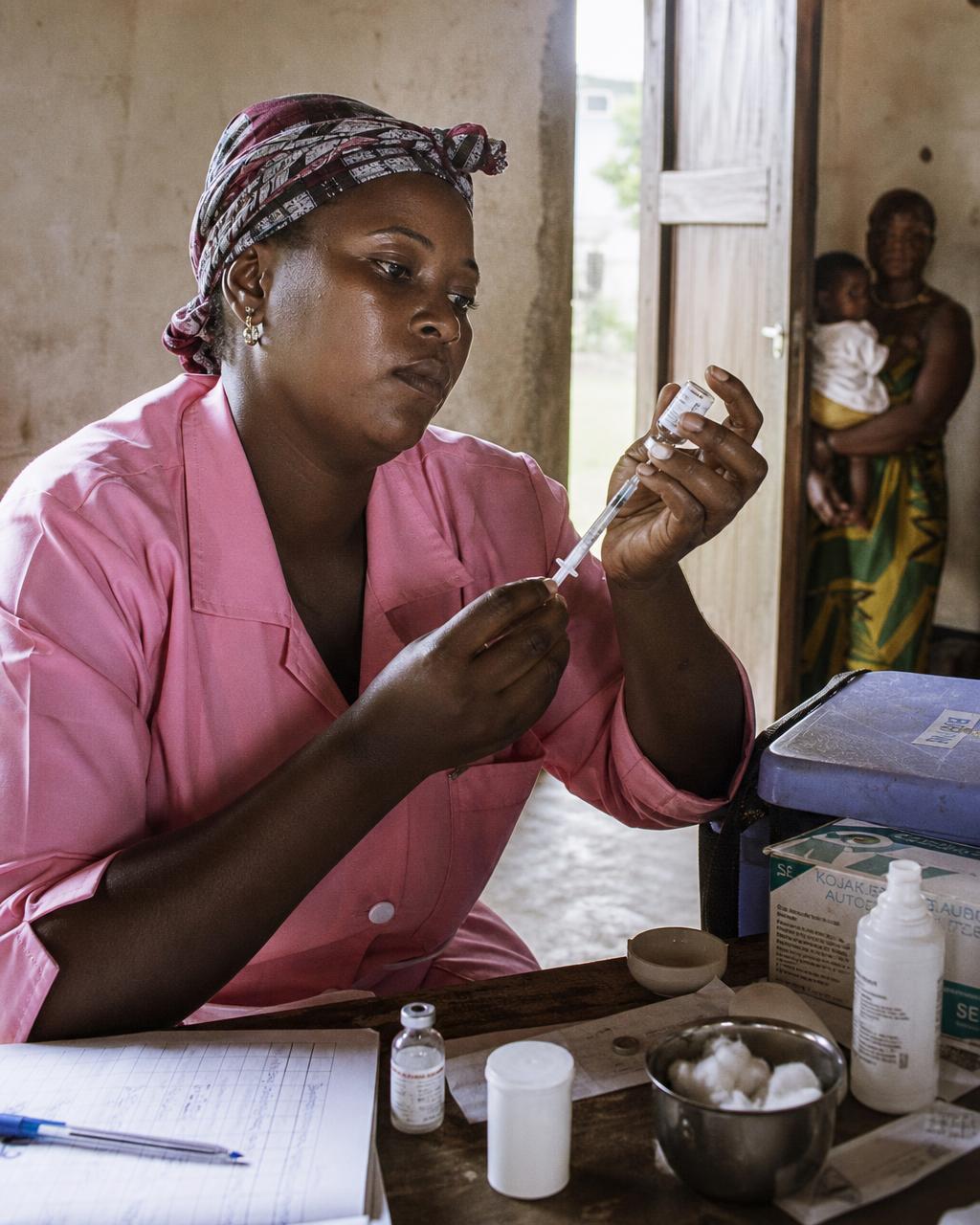 Healthcare worker preparing a vaccine